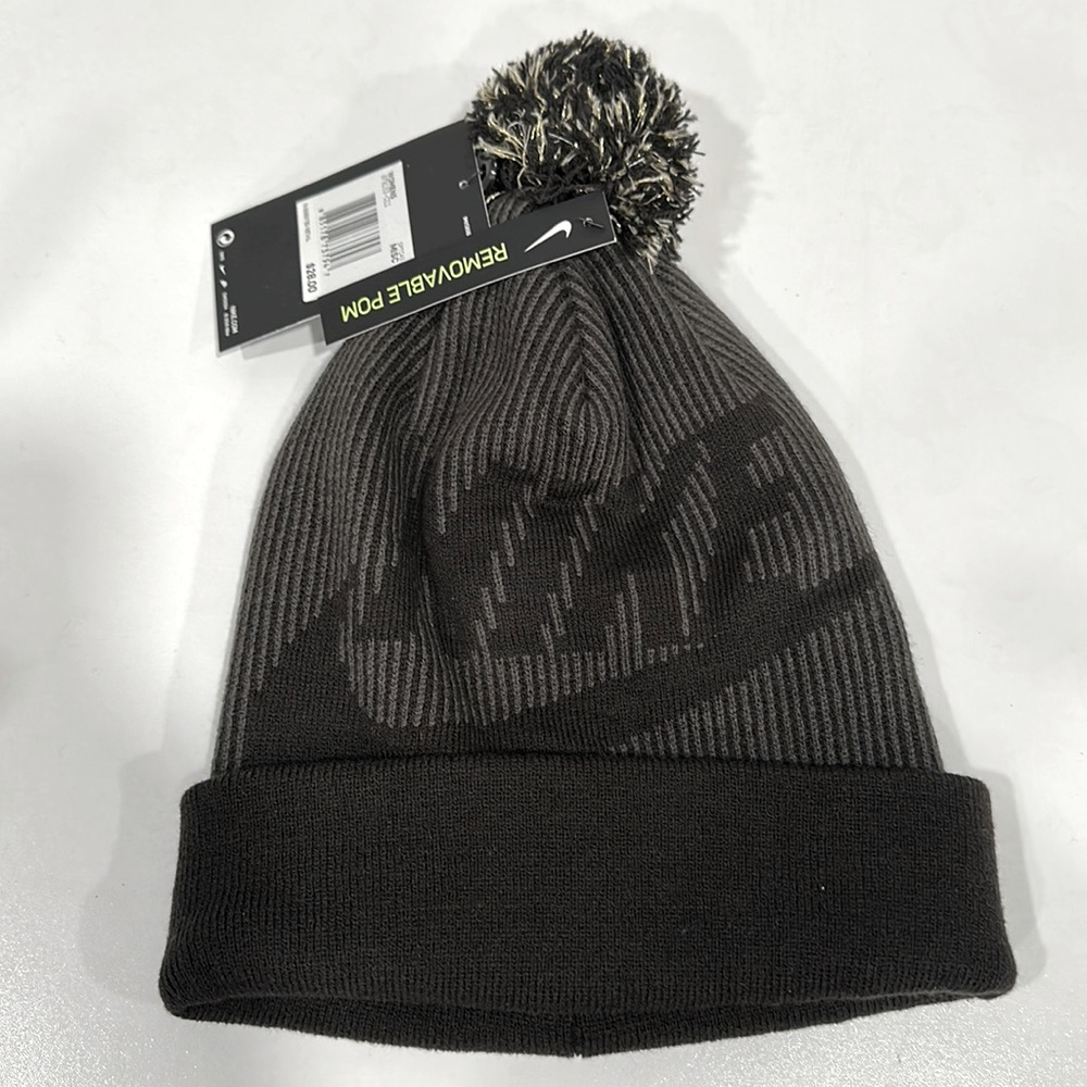Nike Unisex Adult Beanie, grey, black, and gold.
